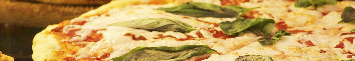 Eating Italian Pizza at The Villa Restaurant & Pizza restaurant in Sandy Hook, CT.